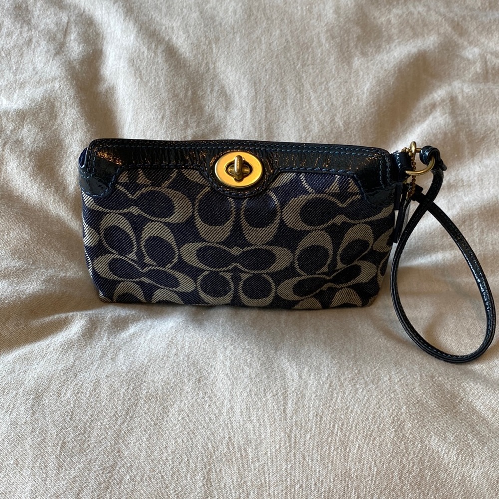 Coach Wristlet. Jean fabric, navy leather strap, gold hardware.
